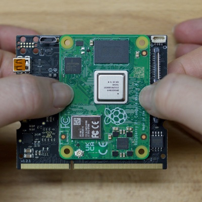 Step 2 - Grab the CM4 at the connectors