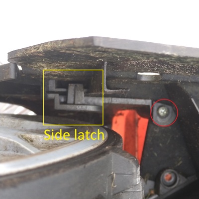 2 Unscrew small screws next to the latch